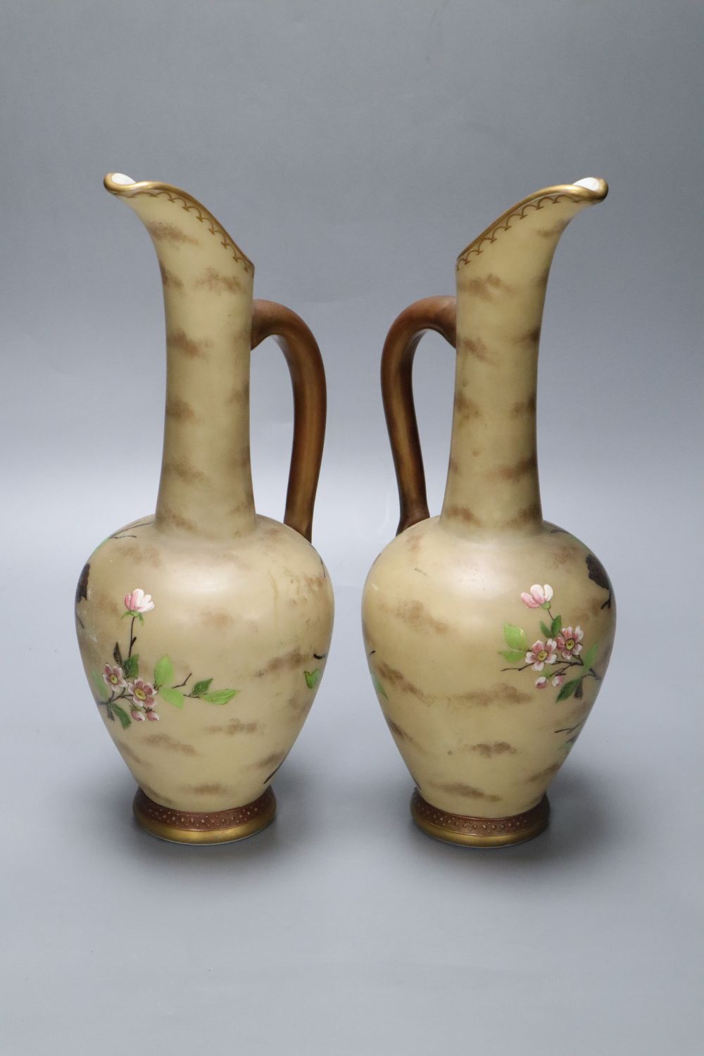 A pair of Victorian opaline glass ewers, height 34cm